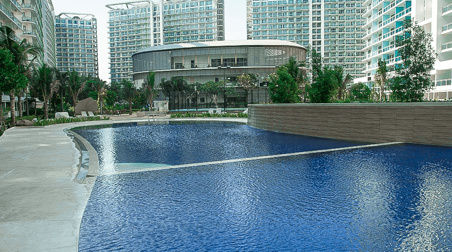 Azure lagoon pool surrounded by resort residences